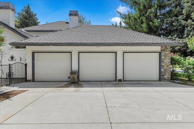 5130 N Lakemont Ln, Garden City, ID 83714 - garage featuring concrete driveway