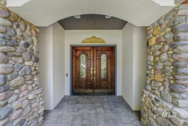 5130 N Lakemont Ln, Garden City, ID 83714 - doorway to property featuring stucco siding