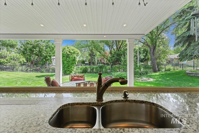 5130 N Lakemont Ln, Garden City, ID 83714 - kitchen view of a sink and stone counters