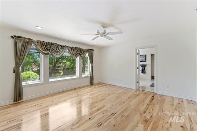 5130 N Lakemont Ln, Garden City, ID 83714 - unfurnished room featuring a ceiling fan, wood finished floors, baseboards, and recessed lighting
