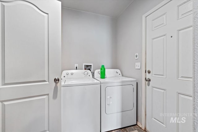 1639 Cuddy View Dr, Council, ID 83612 - laundry area featuring dark wood-type flooring and washer and clothes dryer