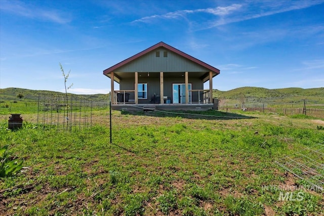 1639 Cuddy View Dr, Council, ID 83612 - rear view of property with a mountain view and a rural view