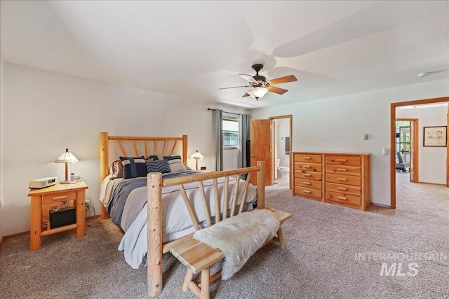 1425 Clements Rd Unit 5, Mccall, ID 83638 - bedroom with light carpet, a ceiling fan, and baseboards