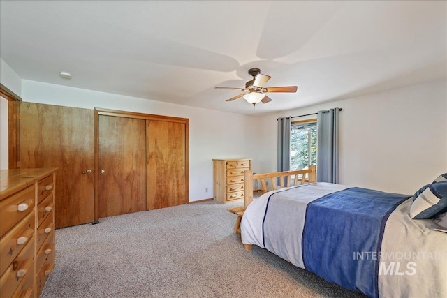 1425 Clements Rd Unit 5, Mccall, ID 83638 - bedroom featuring a closet, light colored carpet, and ceiling fan