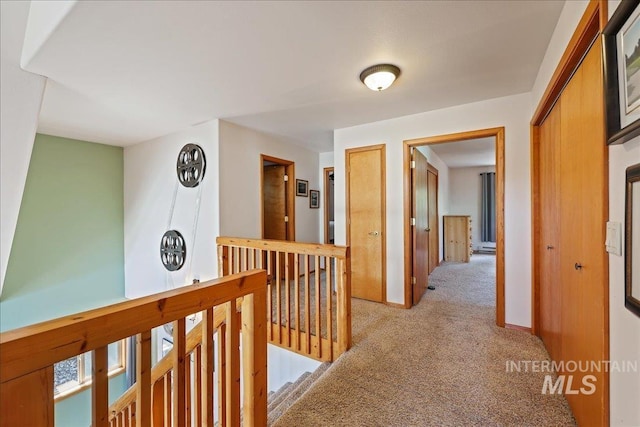 1425 Clements Rd Unit 5, Mccall, ID 83638 - hall featuring light colored carpet and an upstairs landing