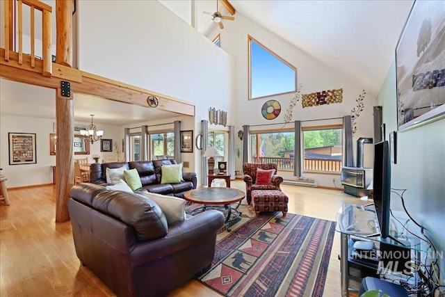 1425 Clements Rd Unit 5, Mccall, ID 83638 - living area with a towering ceiling, light wood-style flooring, and a chandelier