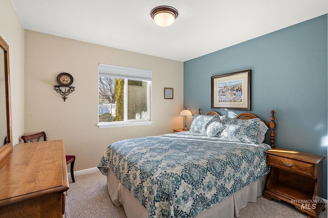 bedroom featuring carpet flooring