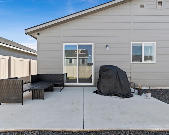 back of house featuring fence and a patio