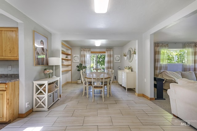 564 Blue Lakes Blvd, Twin Falls, ID 83301 - dining area featuring baseboards
