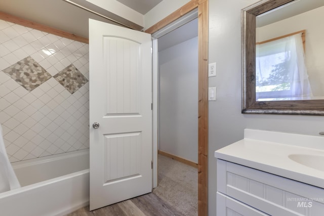 564 Blue Lakes Blvd, Twin Falls, ID 83301 - bathroom with vanity, wood finished floors, and shower / bathtub combination
