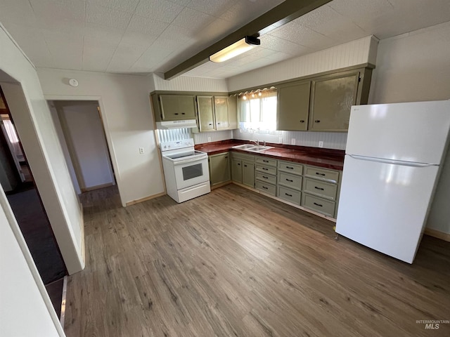 564 Blue Lakes Blvd, Twin Falls, ID 83301 - kitchen with white appliances, a sink, wood finished floors, wooden counters, and range hood