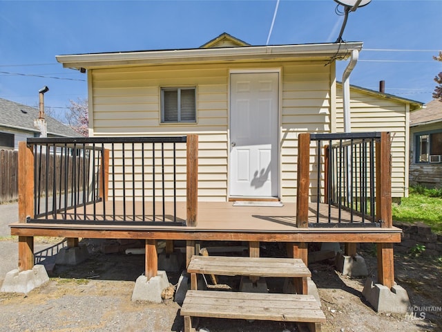 rear view of property with a deck
