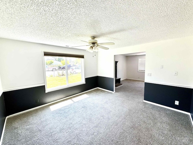 2104 S Chestnut St, Nampa, ID 83686 - carpeted empty room with ceiling fan and a textured ceiling