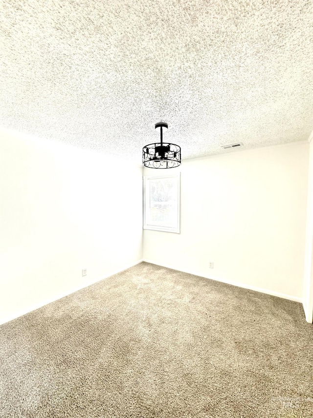 2104 S Chestnut St, Nampa, ID 83686 - unfurnished room with carpet floors and a textured ceiling
