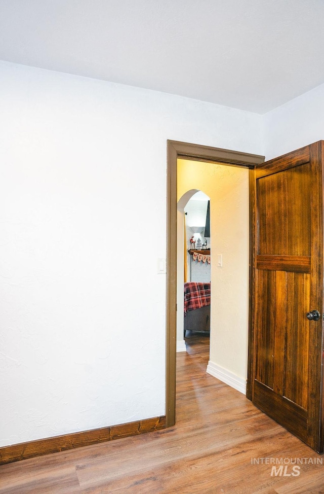 unfurnished room featuring light wood-type flooring