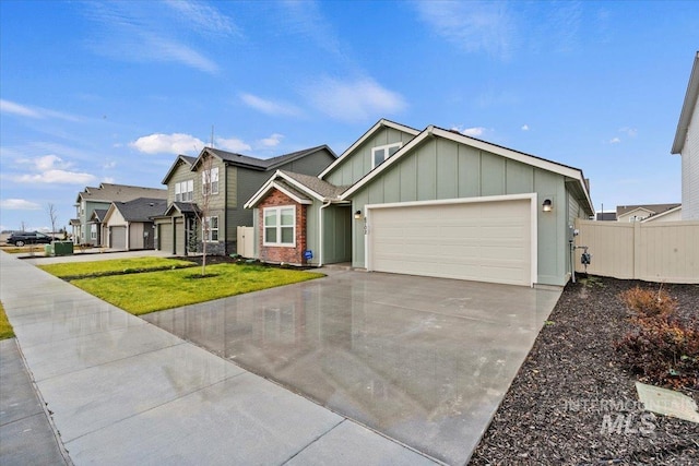 view of front facade with a garage and a front yard