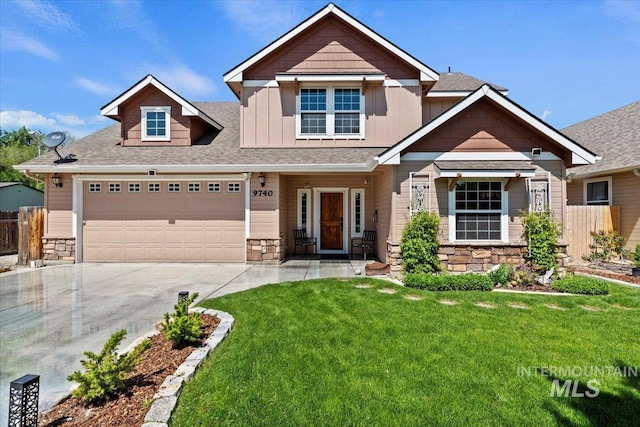 9740 W Shields Ave, Boise, ID 83714 - craftsman inspired home with stone siding, driveway, board and batten siding, and an attached garage