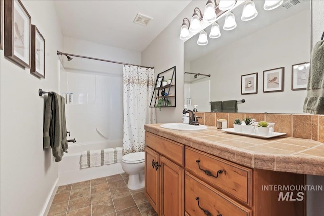 9740 W Shields Ave, Boise, ID 83714 - bathroom with toilet, shower / tub combo with curtain, and vanity