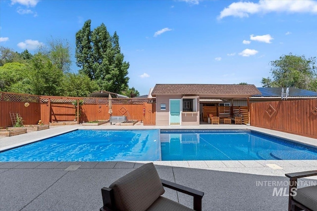 9740 W Shields Ave, Boise, ID 83714 - view of swimming pool featuring a fenced backyard and a patio