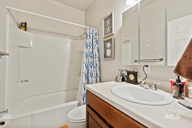 9740 W Shields Ave, Boise, ID 83714 - bathroom featuring vanity, shower / bath combo, and toilet