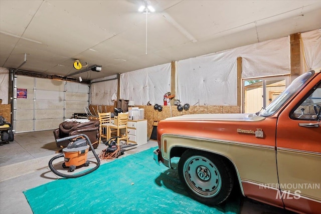 9740 W Shields Ave, Boise, ID 83714 - garage featuring a garage door opener