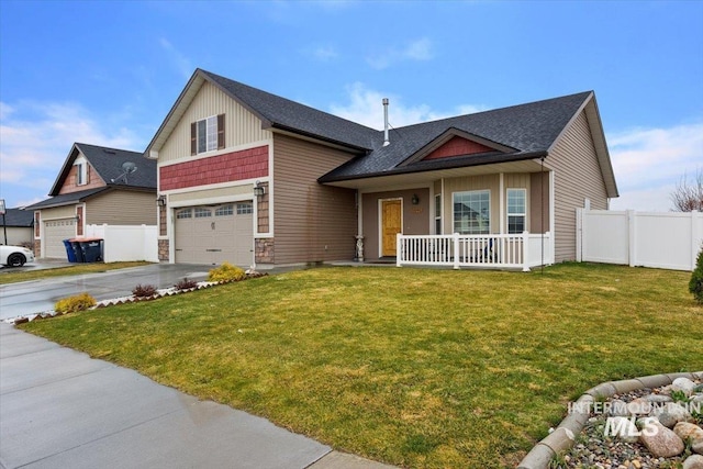 1095 Starlight Loop, Twin Falls, ID 83301 - view of front of home with a porch, driveway, a garage, and a shingled roof