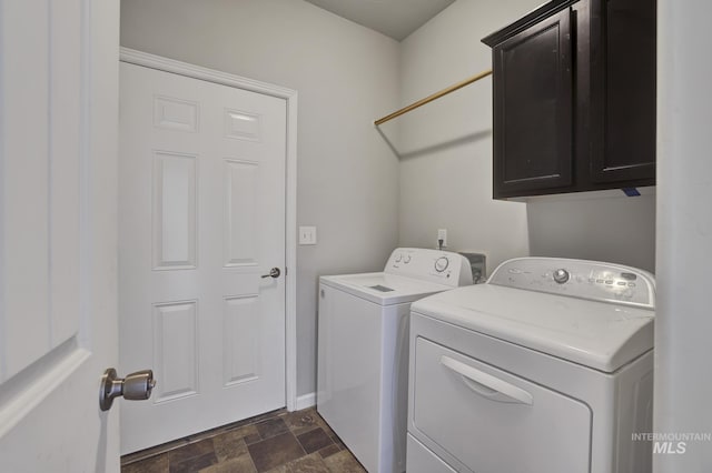 1095 Starlight Loop, Twin Falls, ID 83301 - laundry room with washer and clothes dryer, cabinet space, and stone finish flooring
