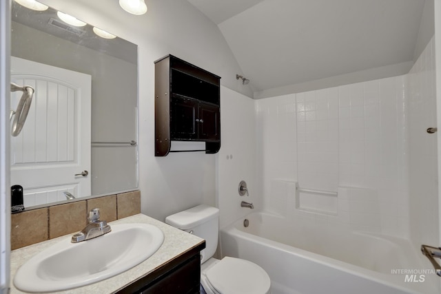 1095 Starlight Loop, Twin Falls, ID 83301 - full bathroom with vanity, vaulted ceiling, shower / bathtub combination, and tasteful backsplash