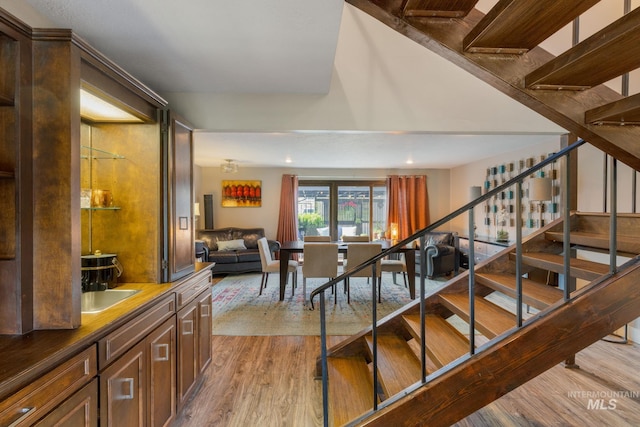 4400 W Pasadena Dr Unit 38, Boise, ID 83705 - staircase featuring wood finished floors and recessed lighting