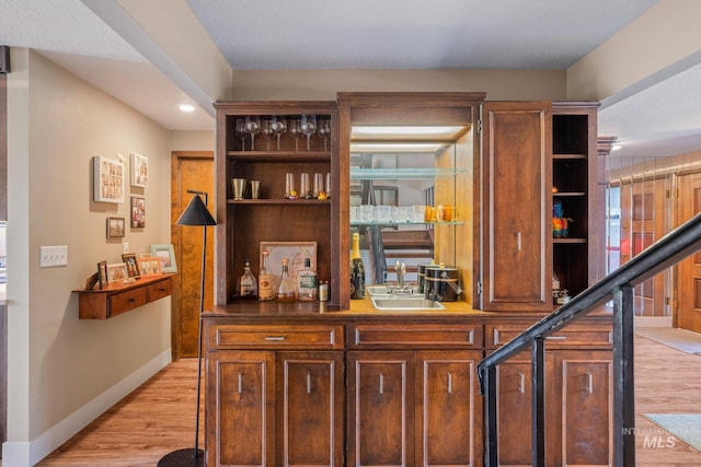4400 W Pasadena Dr Unit 38, Boise, ID 83705 - indoor wet bar featuring baseboards, light wood-style flooring, and recessed lighting