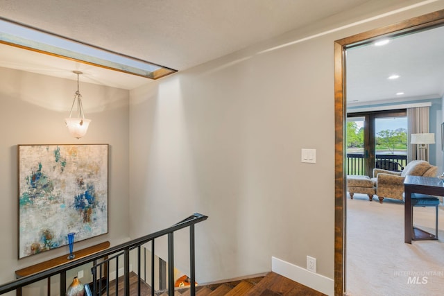 4400 W Pasadena Dr Unit 38, Boise, ID 83705 - corridor with an upstairs landing, wood finished floors, recessed lighting, and baseboards