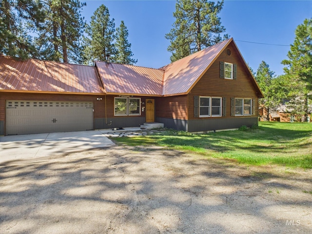 9 Pond Overlook, Idaho City, ID 83631 - rustic home featuring a front lawn, driveway, an attached garage, and metal roof