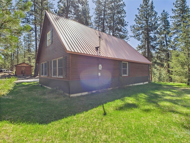 9 Pond Overlook, Idaho City, ID 83631 - view of home's exterior with a yard and metal roof
