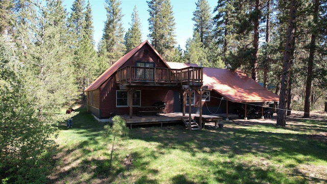 9 Pond Overlook, Idaho City, ID 83631 - rear view of property featuring a deck, a yard, and metal roof