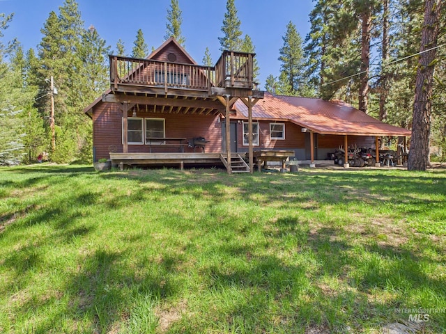 9 Pond Overlook, Idaho City, ID 83631 - rear view of house featuring a yard and a deck