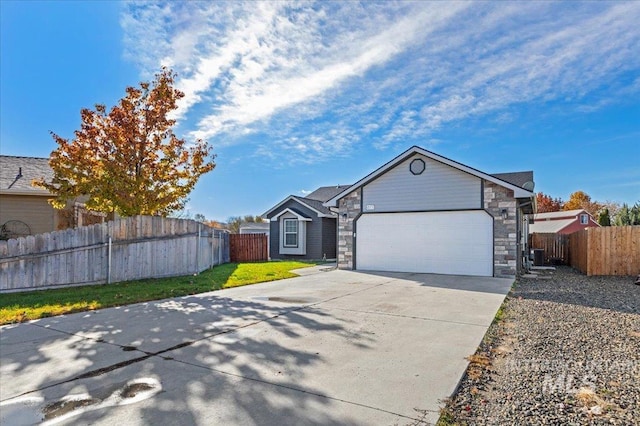 single story home featuring a garage