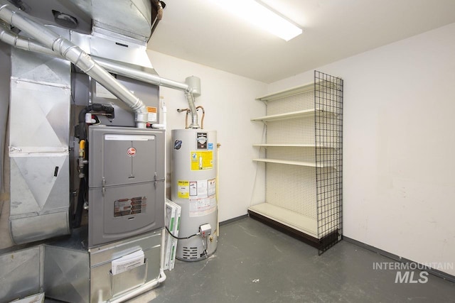 utility room featuring water heater