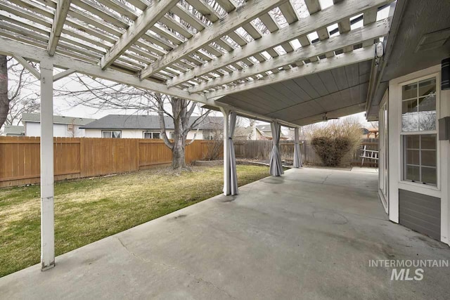 view of patio / terrace featuring a fenced backyard and a pergola