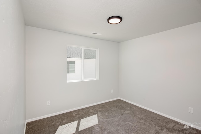 empty room featuring carpet