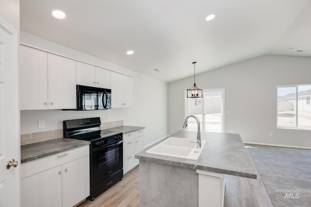 kitchen featuring sink, black appliances, white cabinets, light colored carpet, and lofted ceiling