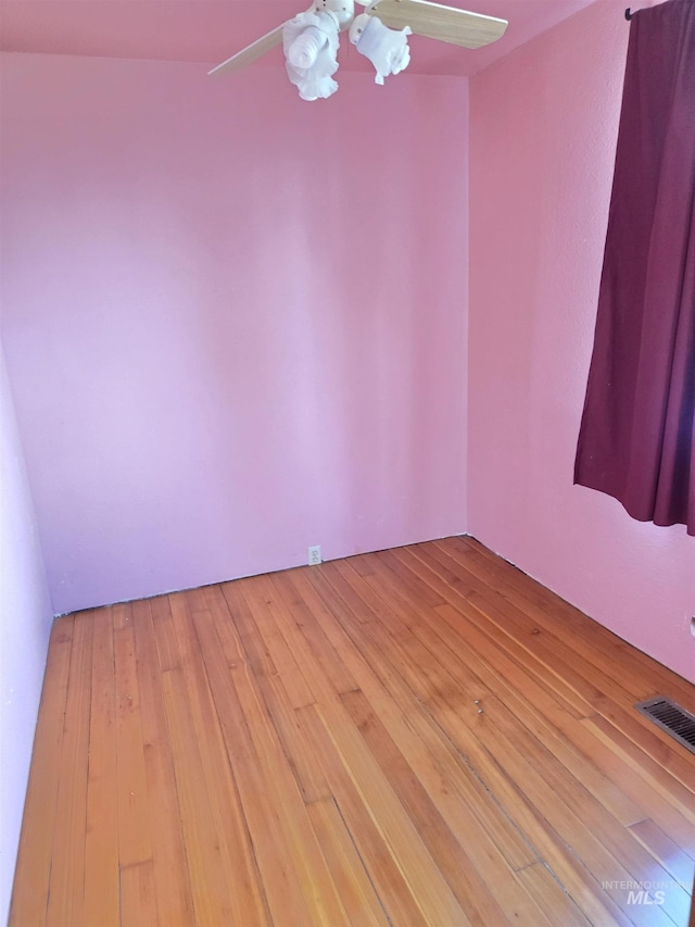 1922 9th Ave, Lewiston, ID 83501 - spare room with a ceiling fan and light wood-style floors