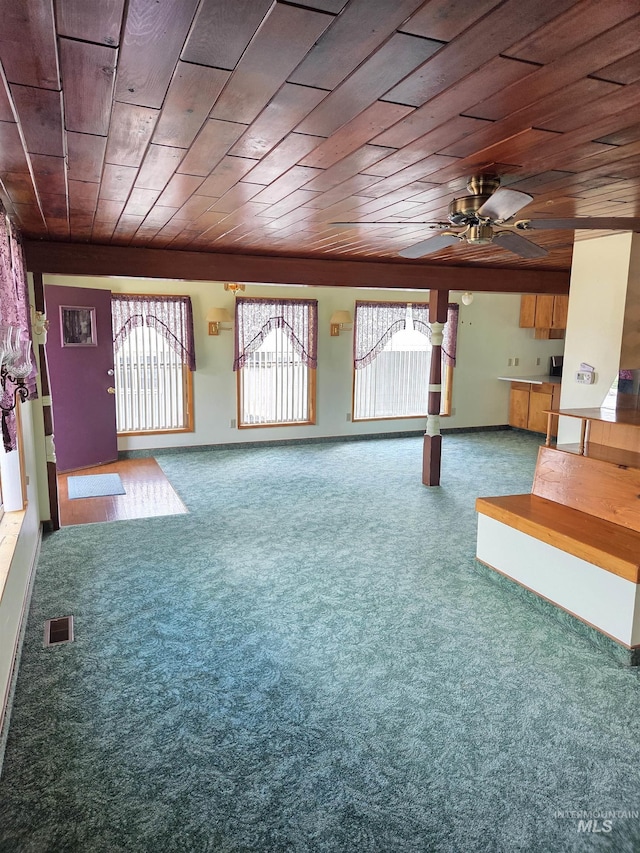1922 9th Ave, Lewiston, ID 83501 - unfurnished living room with carpet, ceiling fan, and wooden ceiling