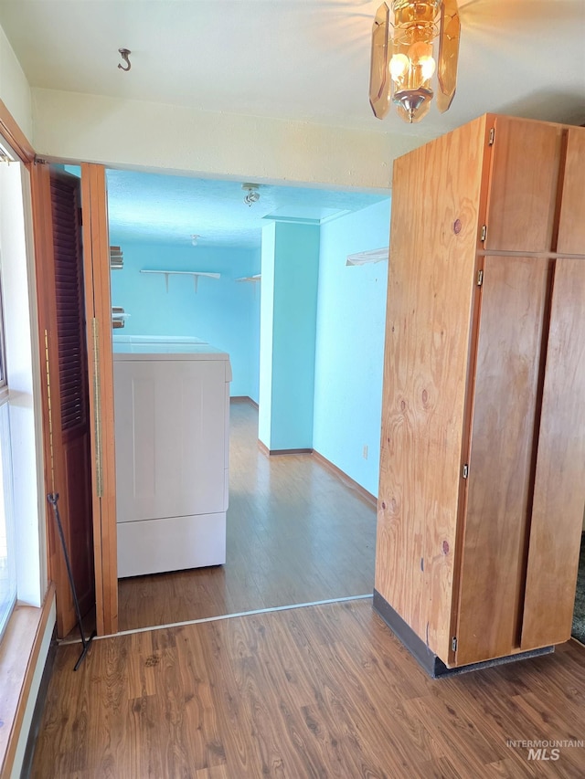 1922 9th Ave, Lewiston, ID 83501 - interior space with washer / dryer, wood finished floors, and baseboards
