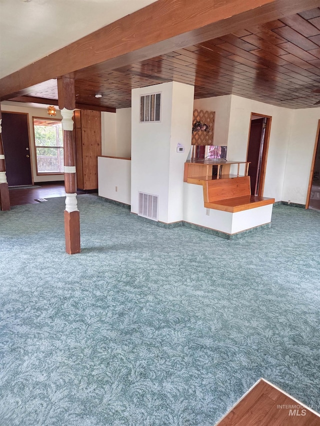 1922 9th Ave, Lewiston, ID 83501 - unfurnished living room with wooden ceiling, carpet, and baseboards