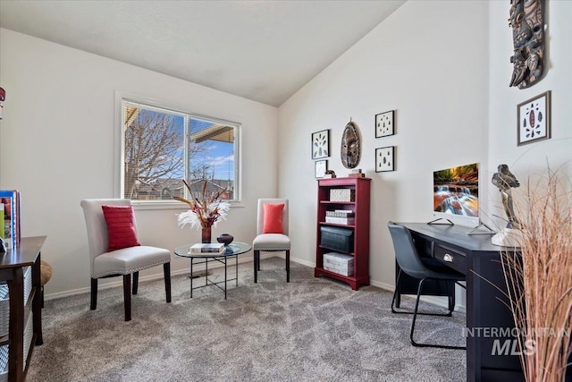 office featuring vaulted ceiling, baseboards, and carpet floors