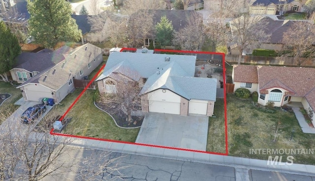 birds eye view of property with a residential view