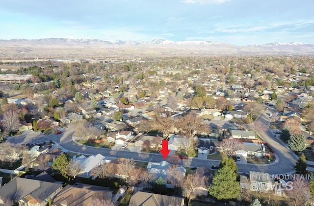 aerial view featuring a residential view and a mountain view