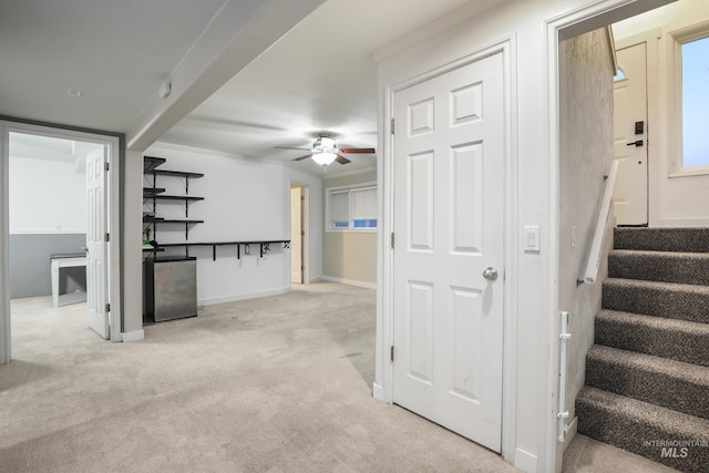 interior space featuring light colored carpet