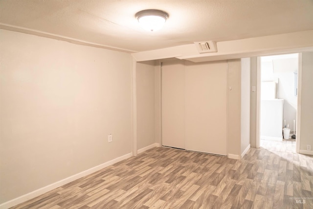 224 S Fern St, Nampa, ID 83686 - unfurnished bedroom with light wood finished floors, a closet, and baseboards
