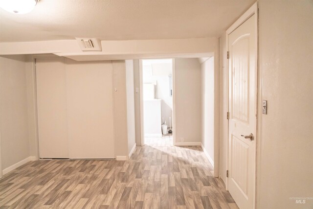 224 S Fern St, Nampa, ID 83686 - hall with light wood-style flooring and baseboards